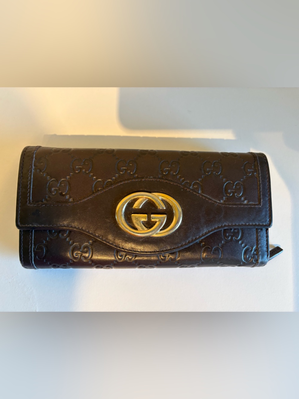 Gucci Brown Embossed GG Leather Wallet with Gold Hardware